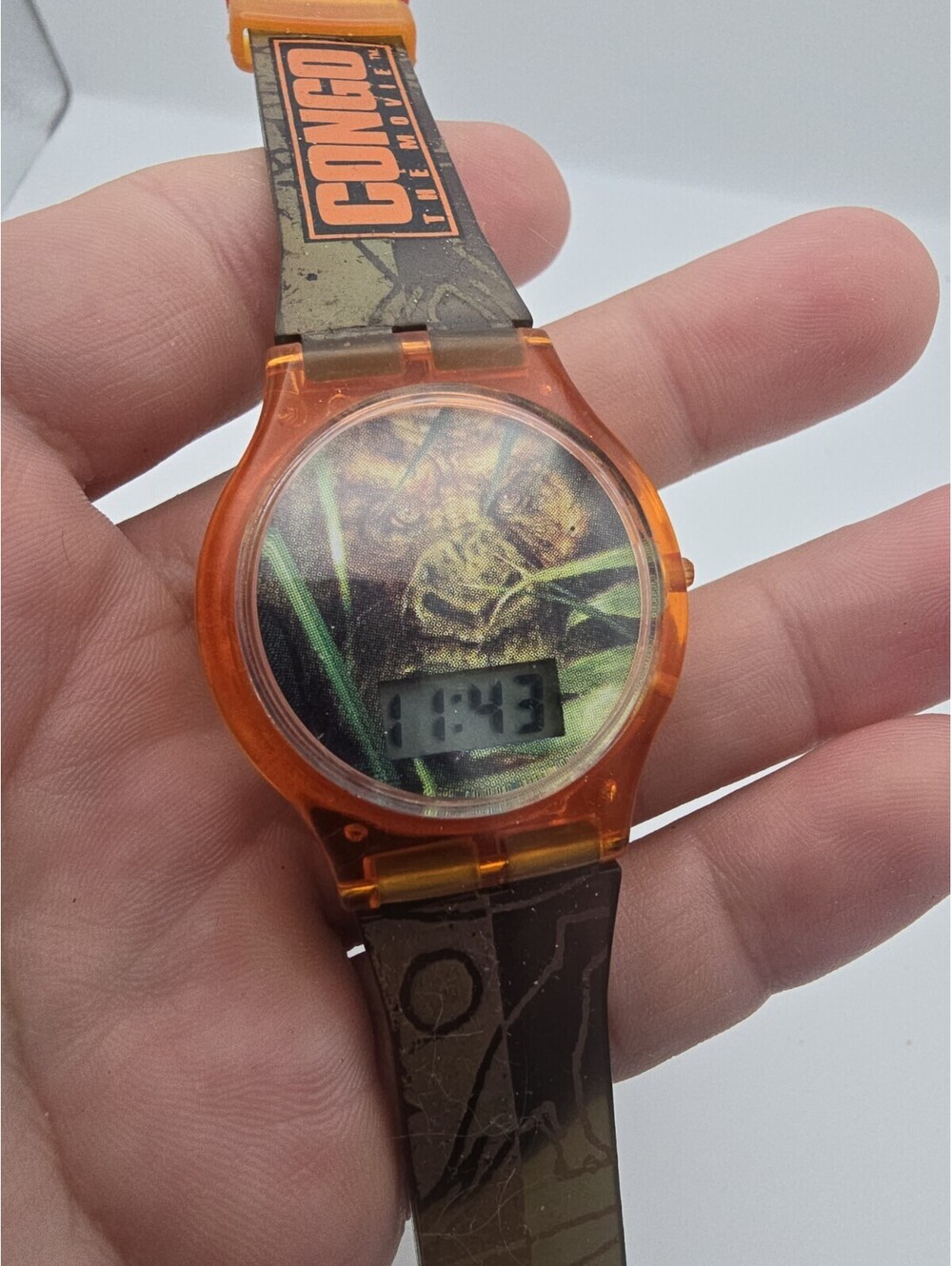 Congo The Movie 1995 Digital Watch Orange Plastic Case Graphic Rubber Band Runs